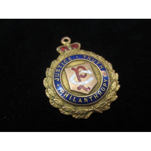207 - A 9 carat gold enamelled Masonic watch fob by Fattorini & Sons, inscribed to reverse 'Presented to B... 