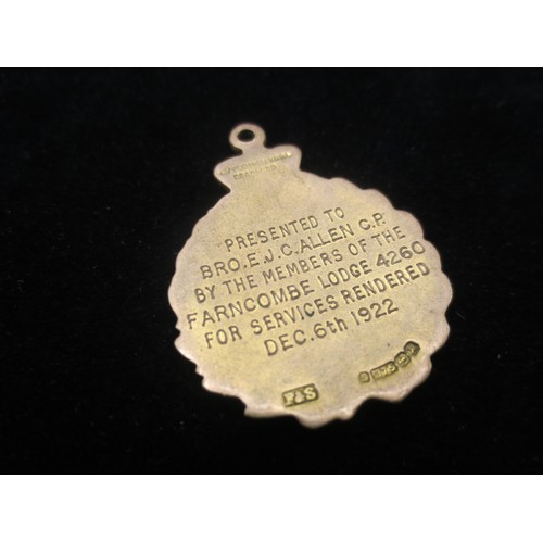 207 - A 9 carat gold enamelled Masonic watch fob by Fattorini & Sons, inscribed to reverse 'Presented to B... 