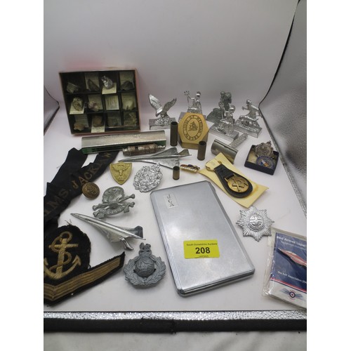 208 - An assortment of militaria and other items including RN chevron in bullion braid, a cap tally for HM... 