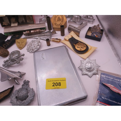 208 - An assortment of militaria and other items including RN chevron in bullion braid, a cap tally for HM... 