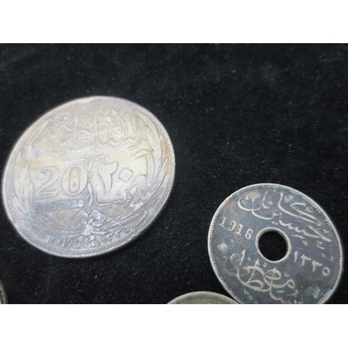 211 - A small assortment of silver coinage including a 1917 Turkish 20 piastres, Irish shilling, WW1 Frenc... 