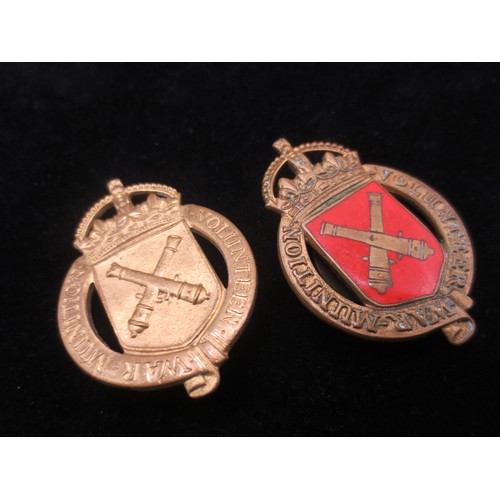 213 - A War Munitions Volunteer badge with enamelled front, marked to the reverse JR Gaunt & Son Ltd and n... 