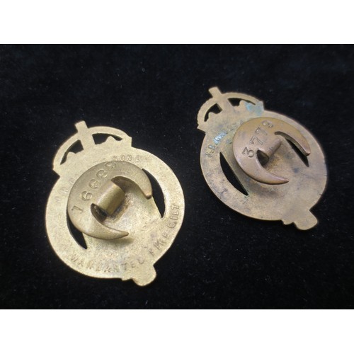 213 - A War Munitions Volunteer badge with enamelled front, marked to the reverse JR Gaunt & Son Ltd and n... 