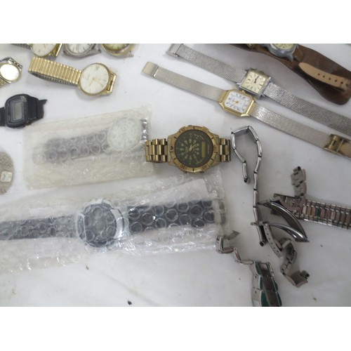 209 - A mixed assortment of mainly manual watches, some running examples including a Kienzle 19 jewel auto... 