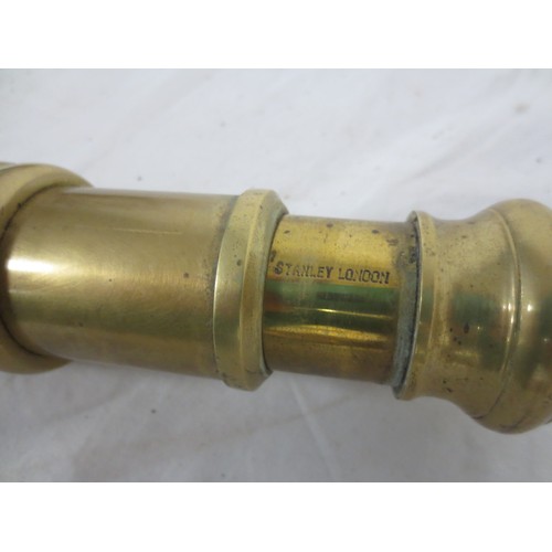 194 - A vintage style brass telescope marked on the lower section for Stanley of London, in good overall c... 