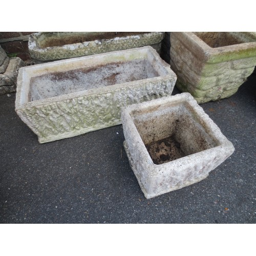 223 - A pair of stonecrete planters, one a trough, the other square, trough measures approx 25