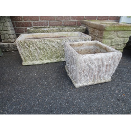 223 - A pair of stonecrete planters, one a trough, the other square, trough measures approx 25