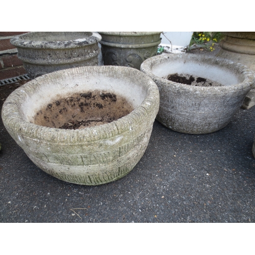 224 - A pair of round stonecrete planters, approximately 16