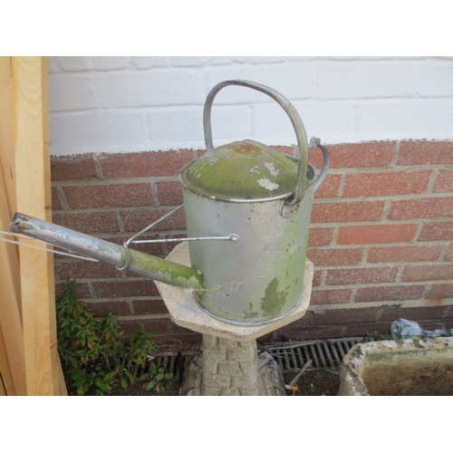228 - A vintage galvanised watering can