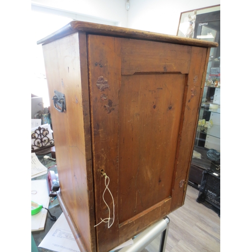 229 - A pine trophy cabinet, the interior with a mount for a trophy and the inside of the door painted for... 