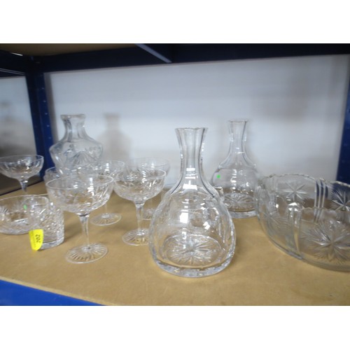 202 - Collection of Cut Glass Decanters and other items including champagne coupes
