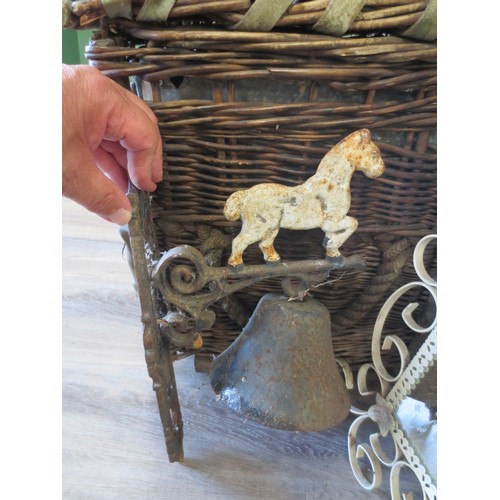 240 - A cast iron external bell with painted figural horse to top, no clapper