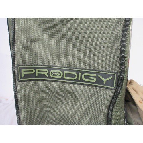 54 - A fishing rod bag containing nine rods and other items, a chair bag with folding seat and backpack s... 