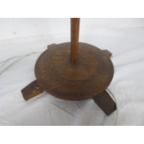 59 - An oak art deco style standard lamp with an interesting finned design