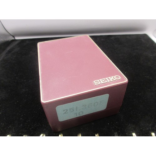 246 - A cased Seiko wristwatch with dual analogue and digital display, requires batteries at least, in ver... 