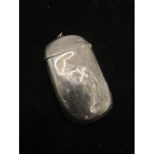 39 - A silver vesta with foliate engraving and vacant escutcheon to one side, gilt interior, marks for Bi... 