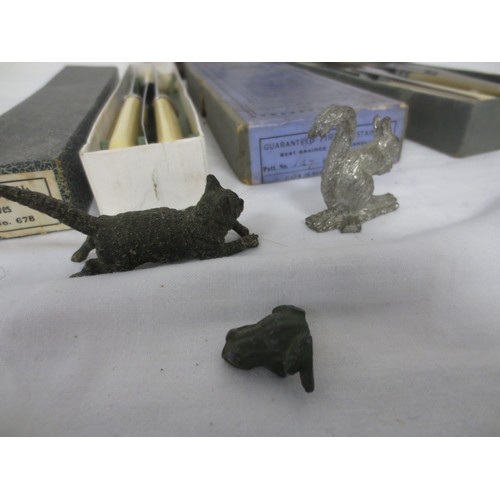 43 - An antique pewter goblet with handle and nicely dimpled finish, two sets of vintage knives, boxed an... 