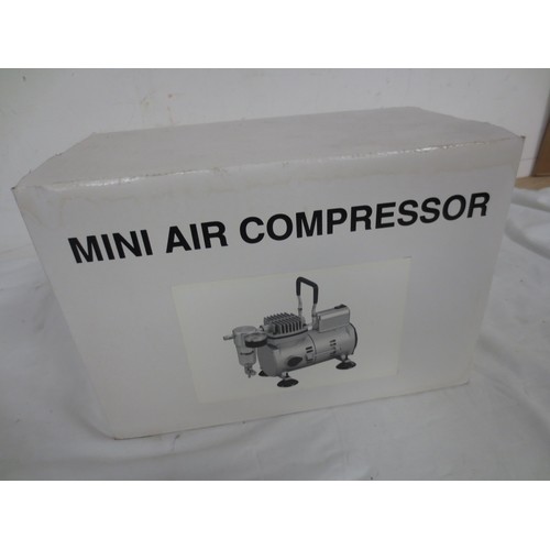10 - A new and boxed Shesto air compressor, cast body, very good quality