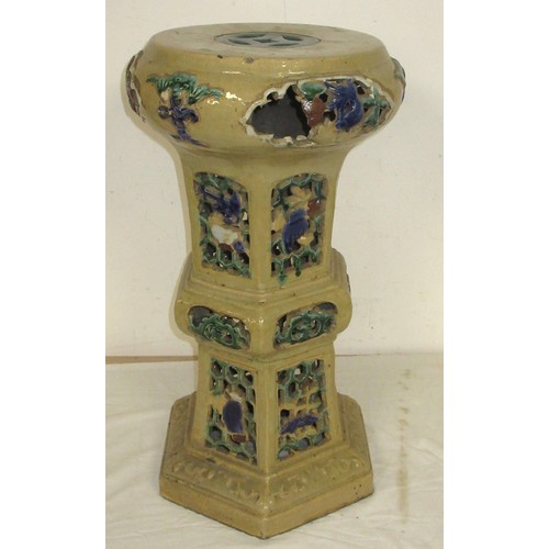 14 - A glazed stoneware plant stand, hexagonal base and section, pierced sides, stands at 60cm, diameter ... 