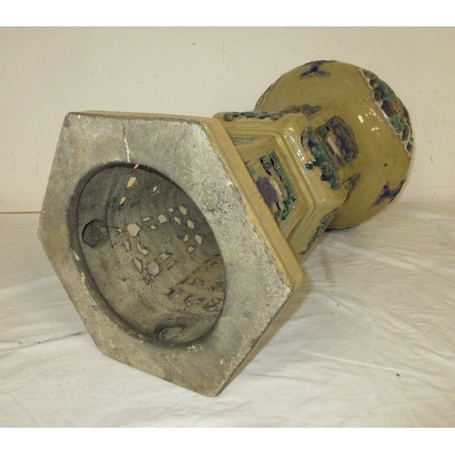 14 - A glazed stoneware plant stand, hexagonal base and section, pierced sides, stands at 60cm, diameter ... 