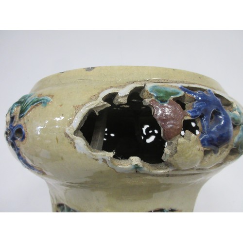 14 - A glazed stoneware plant stand, hexagonal base and section, pierced sides, stands at 60cm, diameter ... 