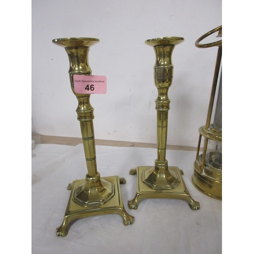 46 - A brass miner's type lamp, a brass vase with serpent handle, and a pair of brass candlesticks (23cm)