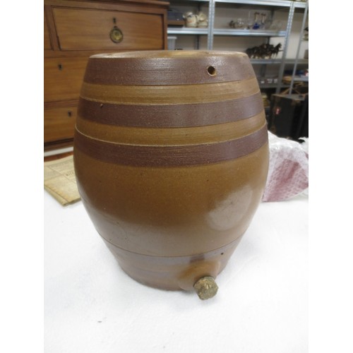 50 - A heavy stoneware barrel-shaped flagon with bunged spigot hole