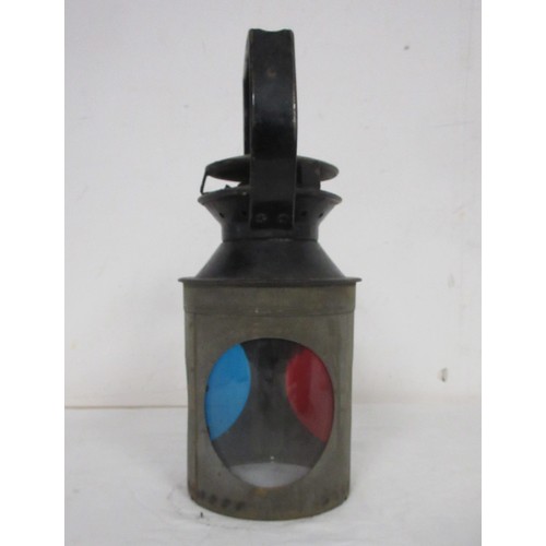 28 - A vintage BR railway lamp in black, with burner and multi-coloured lenses, in very good cosmetic ord... 