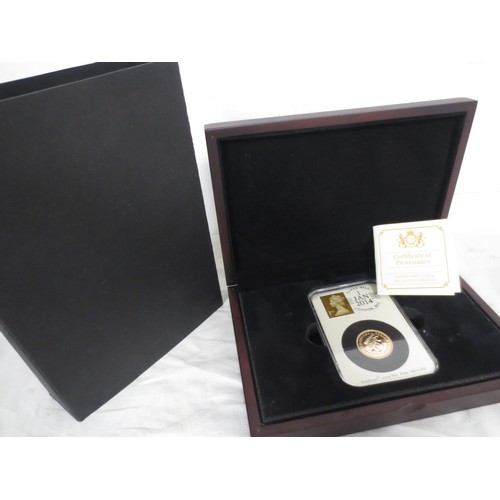 3 - A dated & stamped 1st January 2014 Queen Elizabeth II gold sovereign, encapsulated and in wooden pre... 