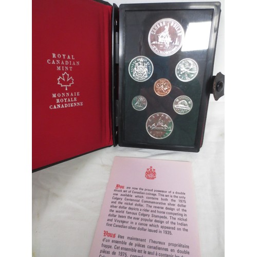 4 - A 1975 Canadian Mint proof set of coinage including the 1975 Calgary Stampede silver dollar coin, in... 