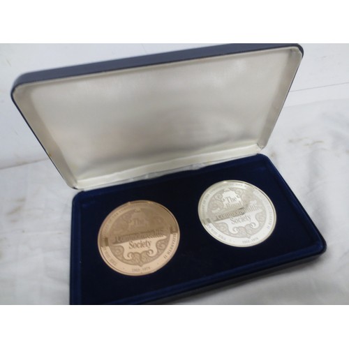 5 - A pair of Royal Commonwealth Society coins, one bronze, the other sterling silver, silver coin weigh... 