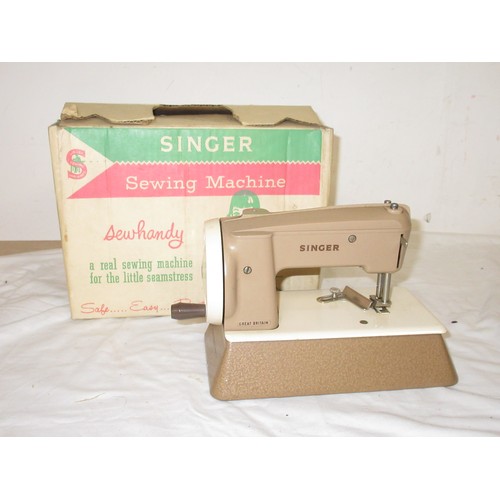 58 - A boxed Singer Sewhandy sewing machine