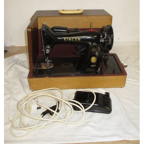 59 - A vintage Singer 99K electric sewing machine in case