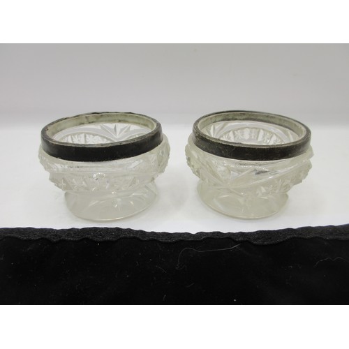 19 - A pair of cut glass salts with a/f Birmingham silver rims, and a set of eight silver-plated teaspoon... 