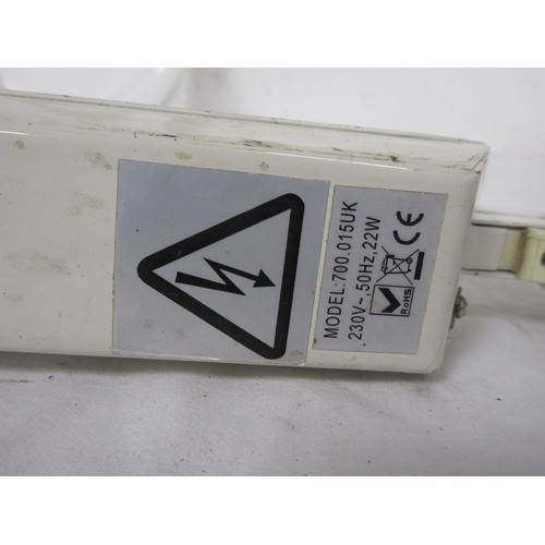 26 - A desk mounted lit and magnifying anglepoise lamp with spare ring bulb