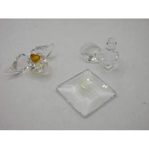 22 - A selection of Swarovski animal figures including a pair o elephants, hedgehog, walrus, poodle, bird... 