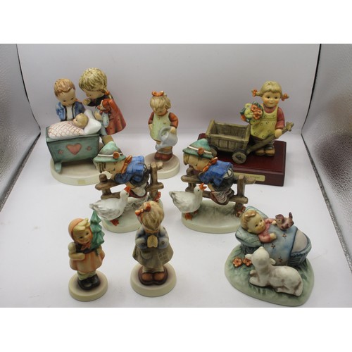 23 - A selection of Hummel figures