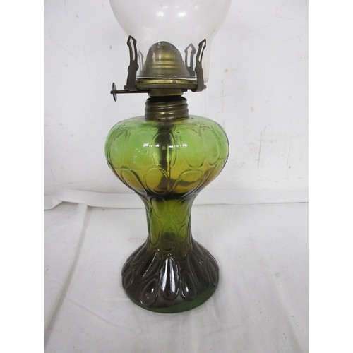 25 - An antique glass oil lamp with glass funnel