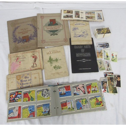 36 - A selection of both mounted and unmounted cigarette cards along with some other collectors cards in ... 