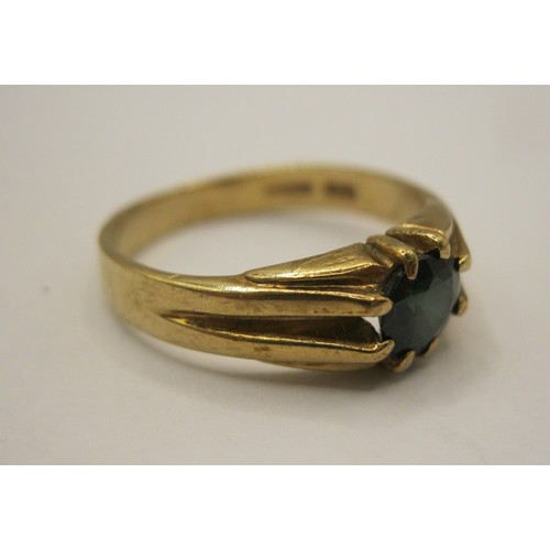 3 - A 9 carat gold ring set with a blue stone, likely sapphire, in very good order, halllmarked, approx ... 