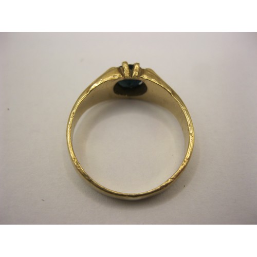 3 - A 9 carat gold ring set with a blue stone, likely sapphire, in very good order, halllmarked, approx ... 