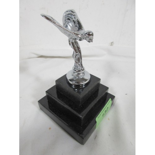 132 - A Spirit Of Ecstasy Mounted on a Stoneware Base.