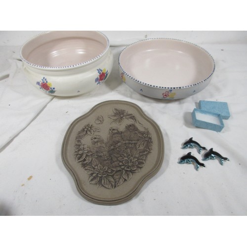 134 - Three Poole Pottery ceramic Dolphin brooches along with a Barbera Linley Adams plaque and two tradit... 