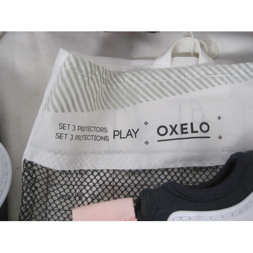 149 - Oxelo Cycle helmet ,Knee protectors and elbow protectors all in very good condition.