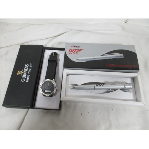 147 - A Guinness branded wristwatch in original packaging, appears unused, requires battery plus a 007 bra... 