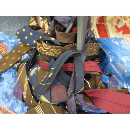 163 - A large bag of assorted ties including some silk examples