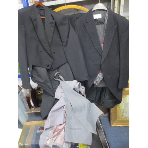 162 - A pair of gentleman's morning suits with tails, approx 40