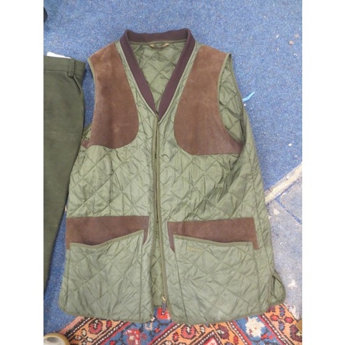 161 - A Barbour fishing gilet, used but in good order, two pairs of moleskin breeches (one by Hucklecote, ... 