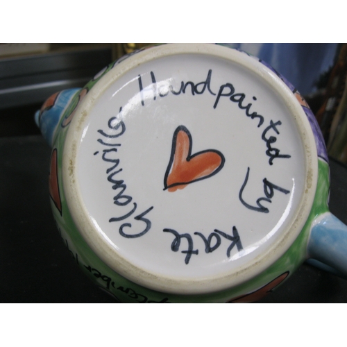 179 - A lovely hand painted teapot by the welch artist Kate Clanville with a couple getting married .Has b... 