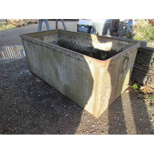 176 - A large antique rivetted water butt or planter in good order, remains watertight, very roughly 4' x ... 